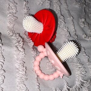 Red and Pink Baby Teething Pacifiers